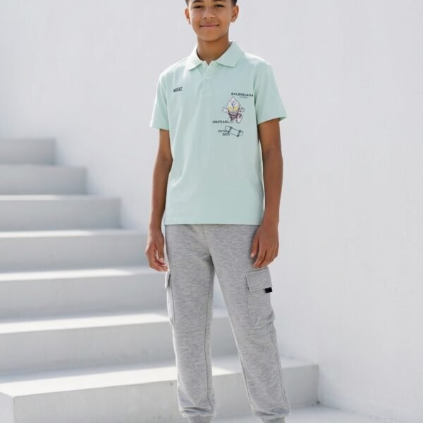 Green t shirt and grey sweatpants