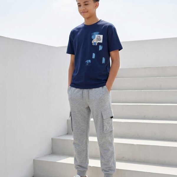 blue t shirt and grey sweatpants